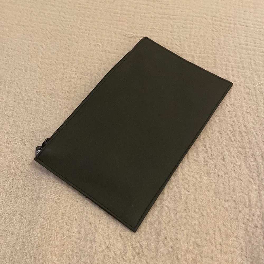 Chanel black cosmetics pouch. New.